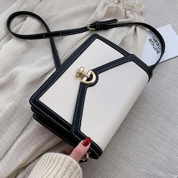 Geanta de dama cu element metalic cu maner lung