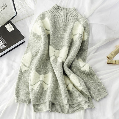 Női téli pulóver magas, kerek nyakkivágással, aszimmetrikus modellel