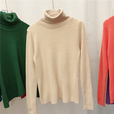 Női pulóver hosszú ujjal, magas gallérral több színben