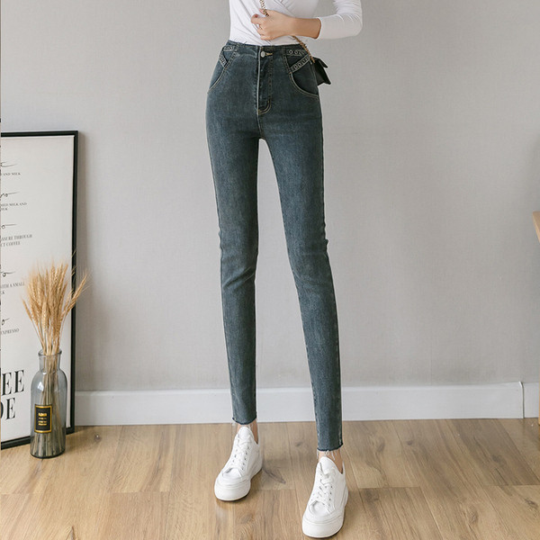 Alkalmi női farmer kék színben, zsebekkel és magas derékkal