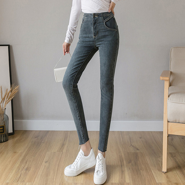 Alkalmi női farmer kék színben, zsebekkel és magas derékkal