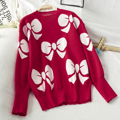 Női téli pulóver, piros karácsonyi motívumokkal