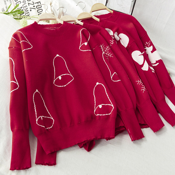 Női téli pulóver, piros karácsonyi motívumokkal