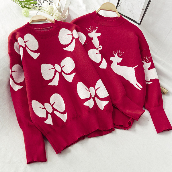 Női téli pulóver, piros karácsonyi motívumokkal