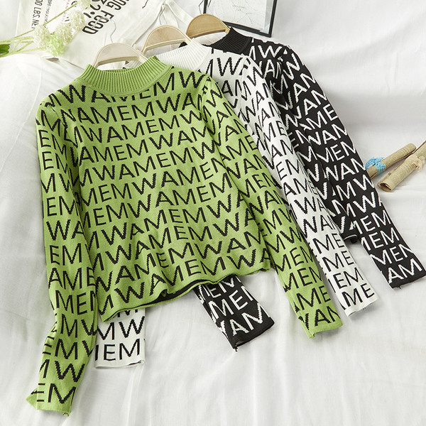 Bluză de iarnă de damă cu aplicare de culoare în verde, alb și negru