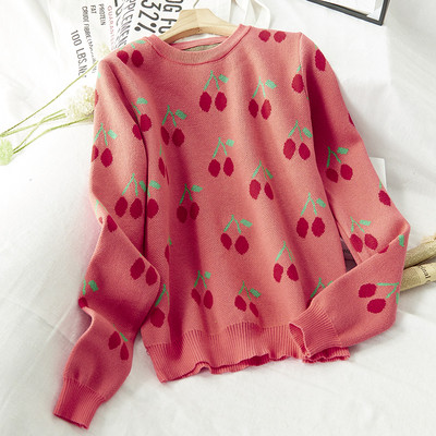 Női téli pulóver színes fekete-fehér hímzéssel