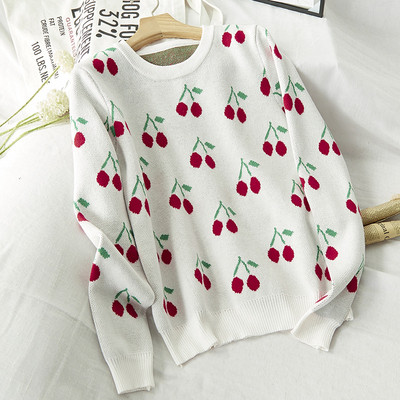 Női téli pulóver színes fekete-fehér hímzéssel