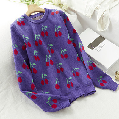 Női téli pulóver színes fekete-fehér hímzéssel