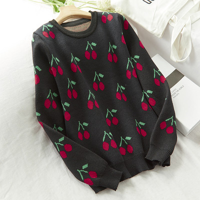 Női téli pulóver színes fekete-fehér hímzéssel