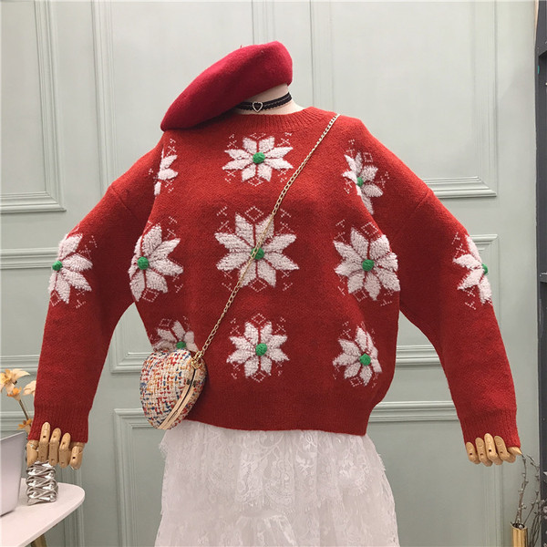 Női karácsonyi pulóver kerek nyakkivágással, piros, kék és zöld hópelyhekkel