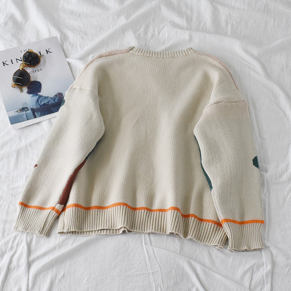 Alkalmi női pulóver bézs és fekete széles modellben