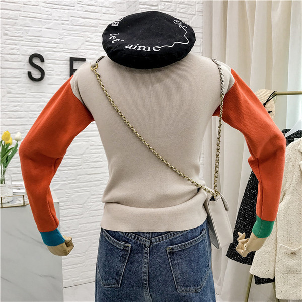 Modern női pulóver kerek nyakkivágással és hosszú ujjú bézs és kék színben