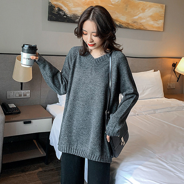 Női széles pulóver V-nyakkal