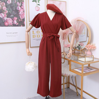 Női overál rövid ujjú, övvel és spitz nyakkivágással több színben