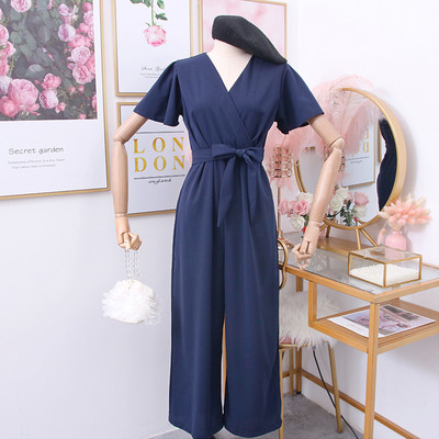 Női overál rövid ujjú, övvel és spitz nyakkivágással több színben