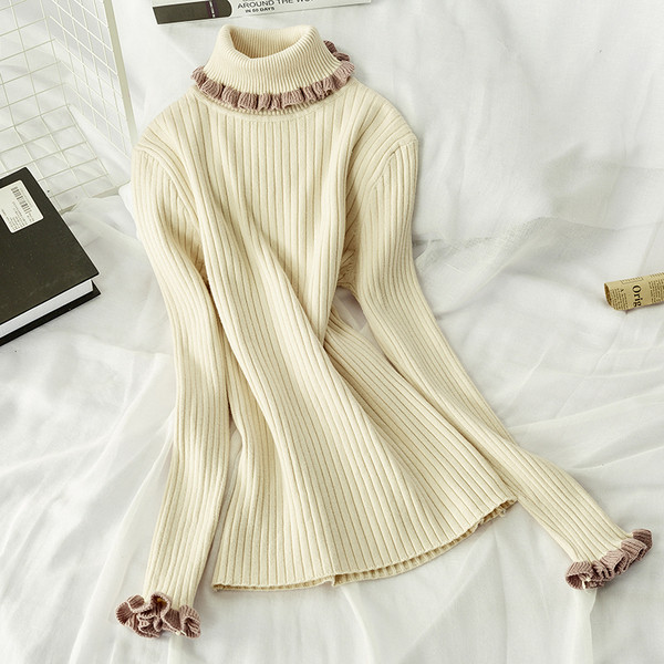 Női téli blúz magas gallérral több színben