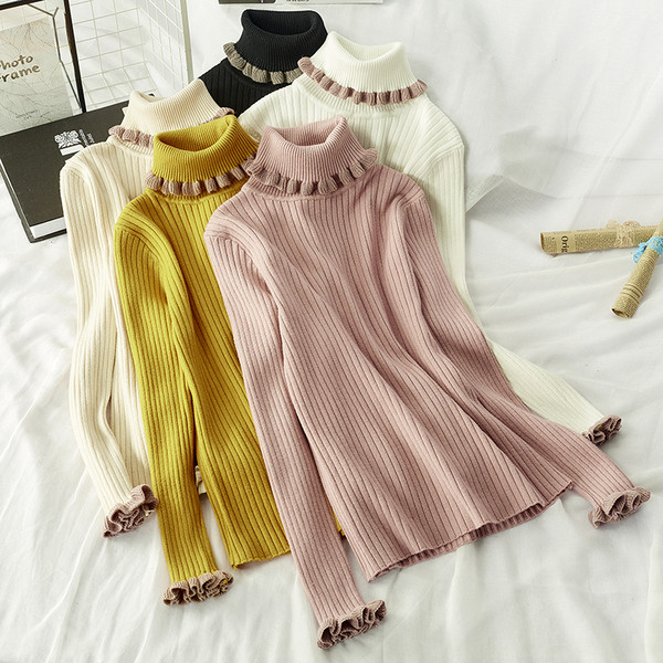 Női téli blúz magas gallérral több színben