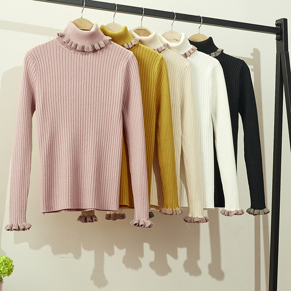 Női téli blúz magas gallérral több színben