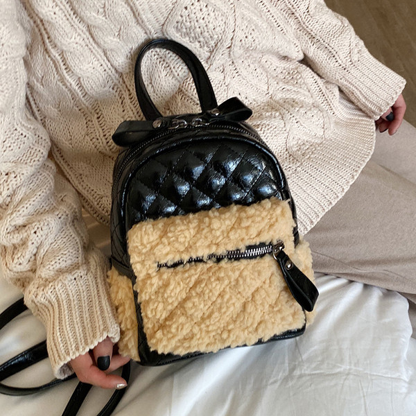 Rucsac modern de dama din piele ecologica cu fermoar in negru si maro