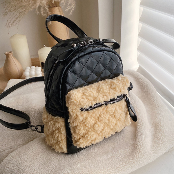 Rucsac modern de dama din piele ecologica cu fermoar in negru si maro