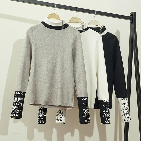 Női blúz feliratokkal és magas gallérral - több színben