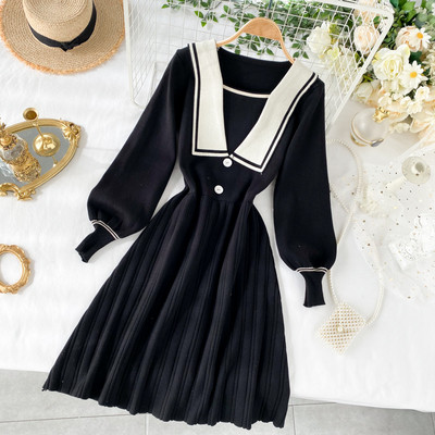 Rochie de dama tricotata cu nasturi si lungime pana la genunchi