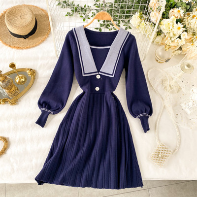 Rochie de dama tricotata cu nasturi si lungime pana la genunchi