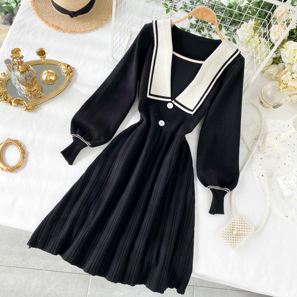 Rochie de dama tricotata cu nasturi si lungime pana la genunchi