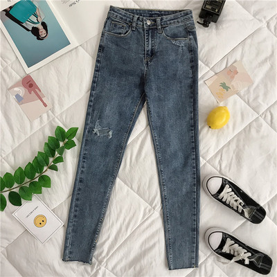 Blugi de dama moderni cu motive rupte Model Slim in albastru si negru