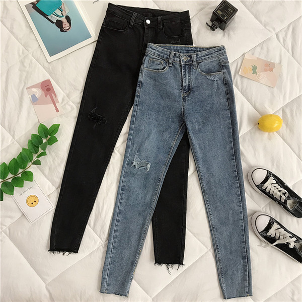 Blugi de dama moderni cu motive rupte Model Slim in albastru si negru