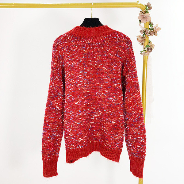 Vesta de dama tricotata cu nasturi de diferite culori in doua culori