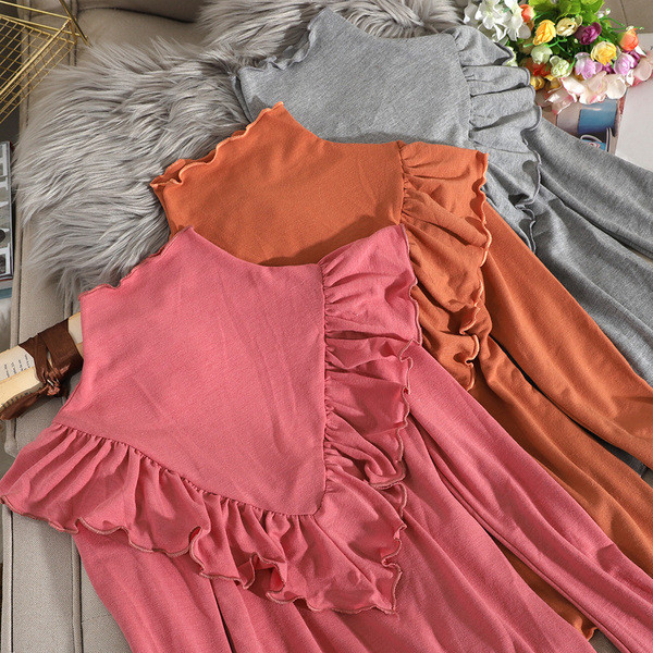 Bluză de damă modernă cu guler polo și bucle