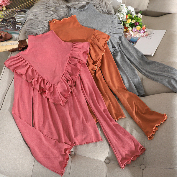 Bluză de damă modernă cu guler polo și bucle