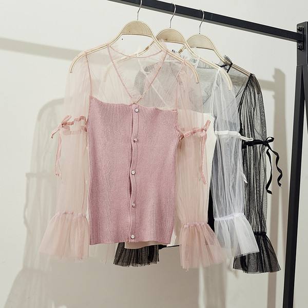 Bluză de damă cu mâneci din tul și cravate în roz, alb și negru