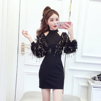 Нов модел дамска рокля Slim модел с пайети на ръкава в черен цвят