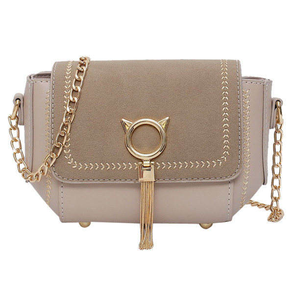 Geanta mica moderna cu decor metalic si ciucuri din piele ecologica