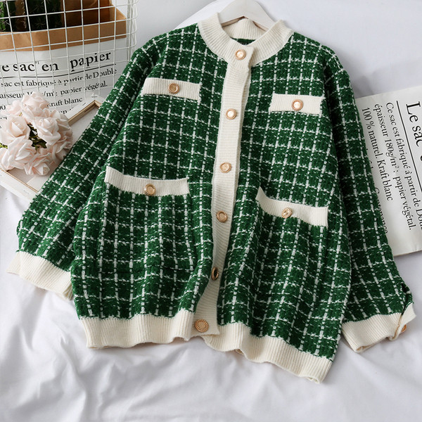 Modern női mellény zöld, rózsaszín és fekete gombokkal és zsebekkel