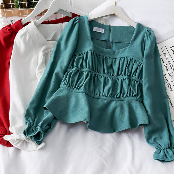 Modern női blúz négyzet alakú nyakkivágással, hátul cipzárral több színben