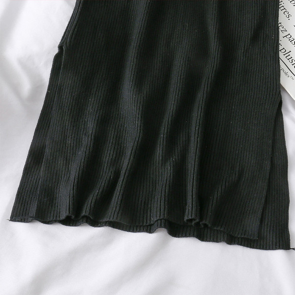 Modern női kötött ruha pólógallérral és hosszú ujjú fekete színben