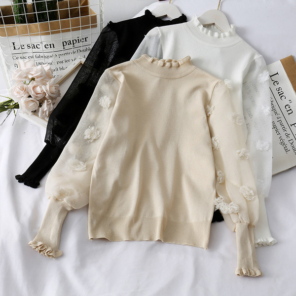 Modern női pulóver magas gallérral és tüll ujjakkal több színben