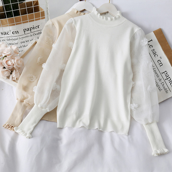 Modern női pulóver magas gallérral és tüll ujjakkal több színben