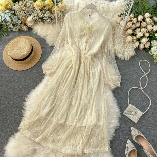 Őszi-téli női hosszú csipkeruha rózsaszín és bézs színű szalaggal