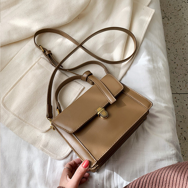 Eko bőrből készült modern női táska rövid és hosszú füllel