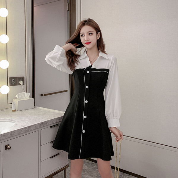 Új modell női ruha spitz nyakkivágással és gombokkal fekete színben