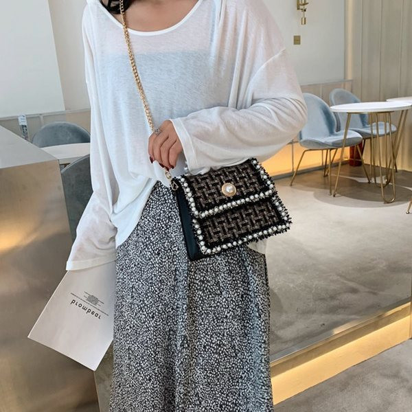 Modern női táska két füllel és gyöngyökkel több színben