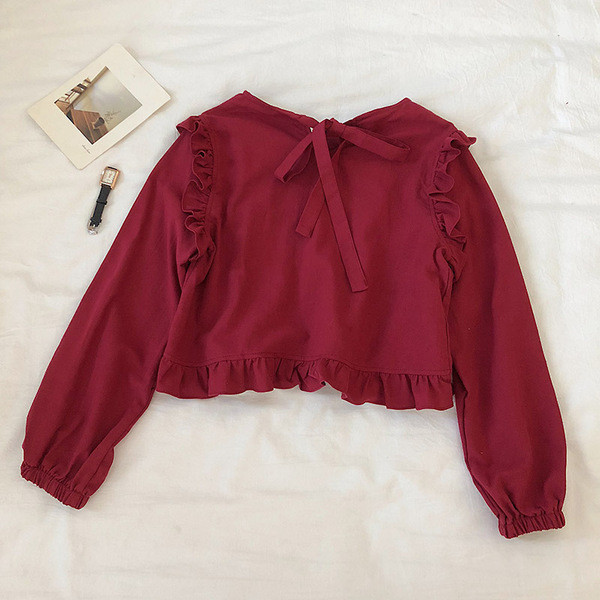 Modern női blúz széles modell kerek nyakkivágással és fürtökkel