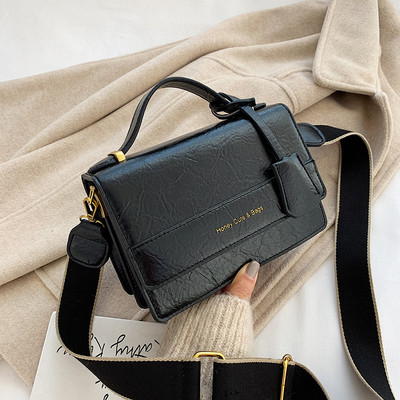 Új modell bőr kézitáska hosszú és rövid fülekkel, piros, fekete és zöld színben