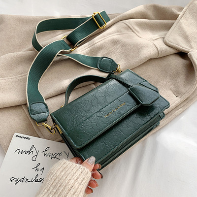 Új modell bőr kézitáska hosszú és rövid fülekkel, piros, fekete és zöld színben