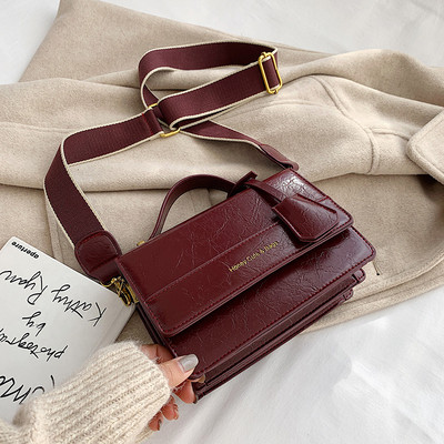 Új modell bőr kézitáska hosszú és rövid fülekkel, piros, fekete és zöld színben