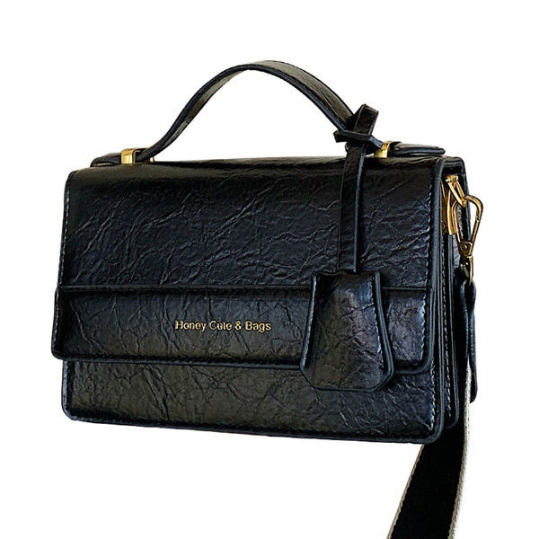 Új modell bőr kézitáska hosszú és rövid fülekkel, piros, fekete és zöld színben